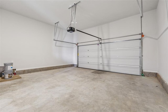 96 Quail Bend Way, Dallas, GA 30157 - garage with baseboards and a garage door opener