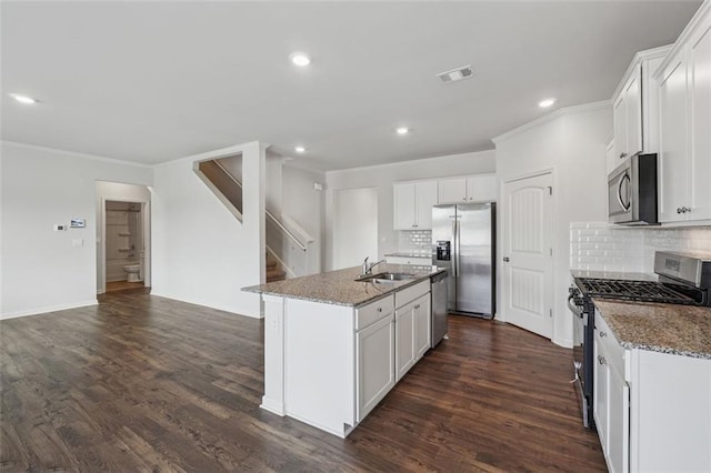 96 Quail Bend Way, Dallas, GA 30157 - kitchen with appliances with stainless steel finishes, a sink, tasteful backsplash, light stone counters, and recessed lighting