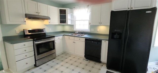 kitchen featuring under cabinet range hood, white cabinetry, black appliances, and a sink