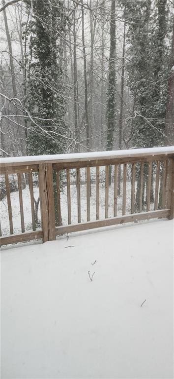 view of snow covered deck