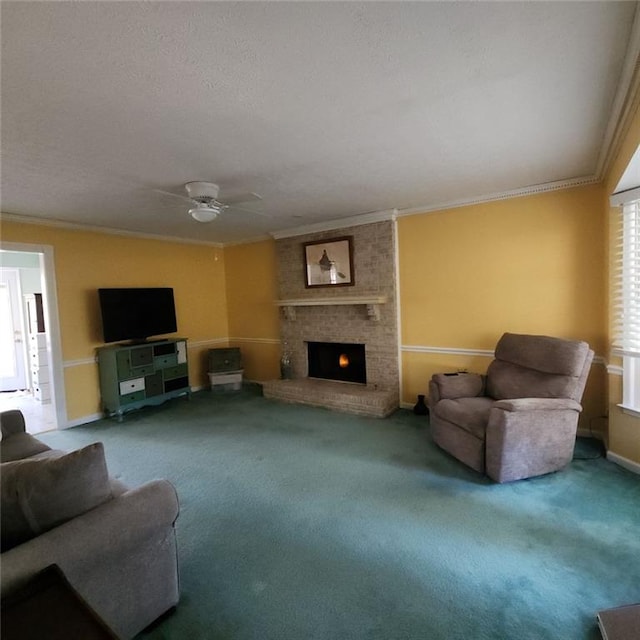 living room featuring crown molding, carpet flooring, and a fireplace