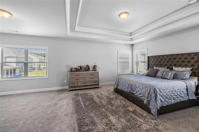 3717 Blue Goose Ln, Loganville, GA 30052 - carpeted bedroom featuring a tray ceiling and crown molding
