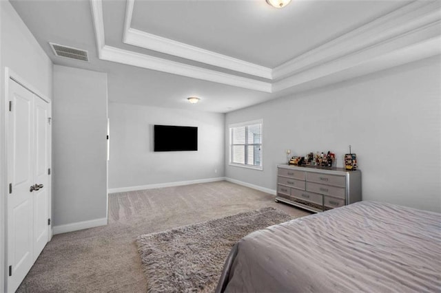 3717 Blue Goose Ln, Loganville, GA 30052 - carpeted bedroom with a tray ceiling and ornamental molding