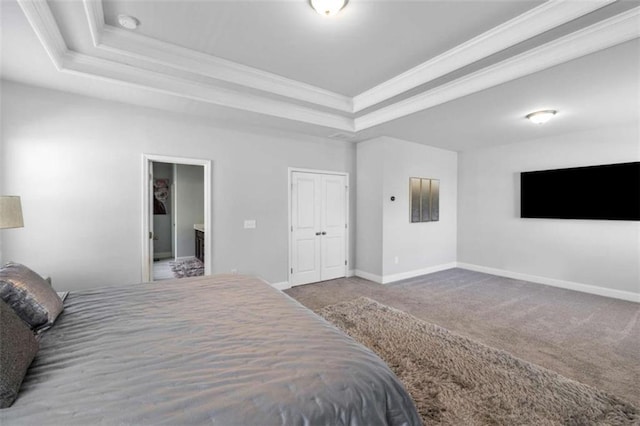 3717 Blue Goose Ln, Loganville, GA 30052 - carpeted bedroom with a tray ceiling and ornamental molding