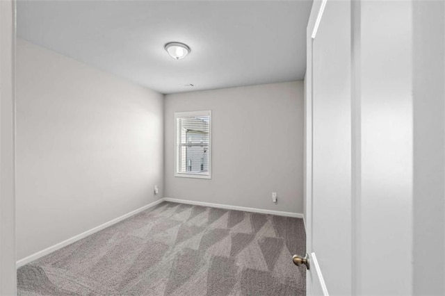 3717 Blue Goose Ln, Loganville, GA 30052 - carpeted spare room with baseboards