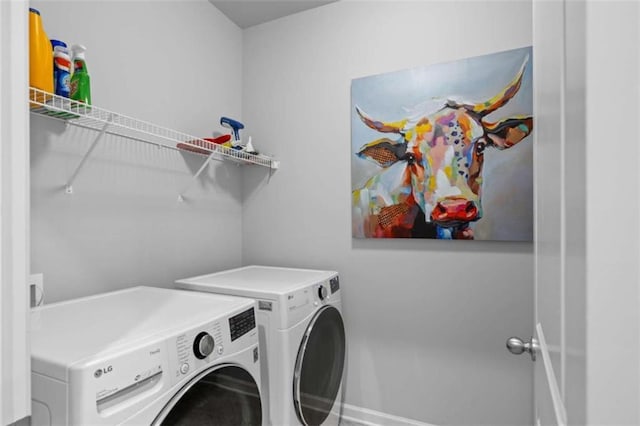 3717 Blue Goose Ln, Loganville, GA 30052 - laundry room with washer and clothes dryer
