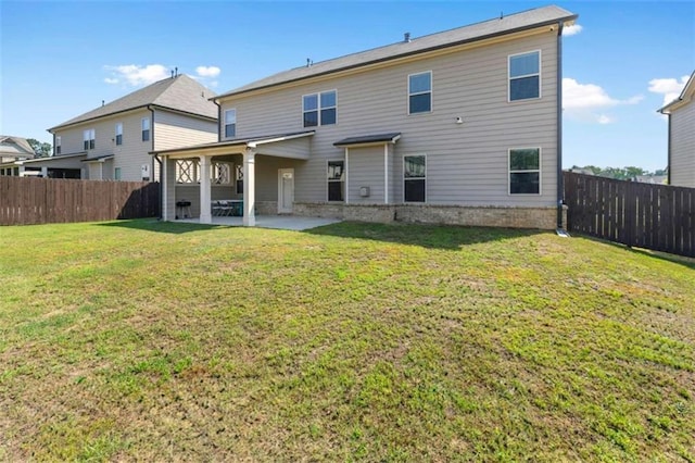 3717 Blue Goose Ln, Loganville, GA 30052 - back of property with a patio area and a fenced backyard