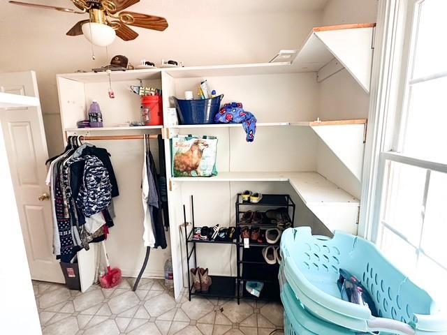 312 Henderson Mill Rd, Mansfield, GA 30055 - storage room with ceiling fan