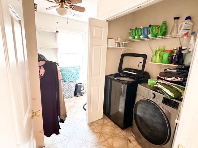 312 Henderson Mill Rd, Mansfield, GA 30055 - washroom featuring laundry area, washer and clothes dryer, light floors, and ceiling fan