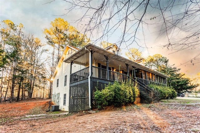 312 Henderson Mill Rd, Mansfield, GA 30055 - exterior space with stairs, cooling unit, and covered porch