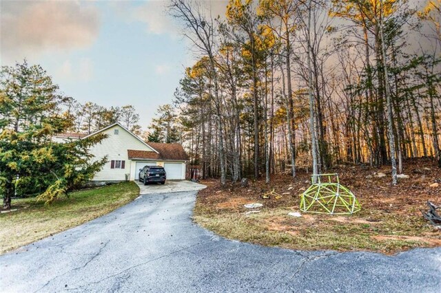 312 Henderson Mill Rd, Mansfield, GA 30055 - exterior space with concrete driveway and an attached garage