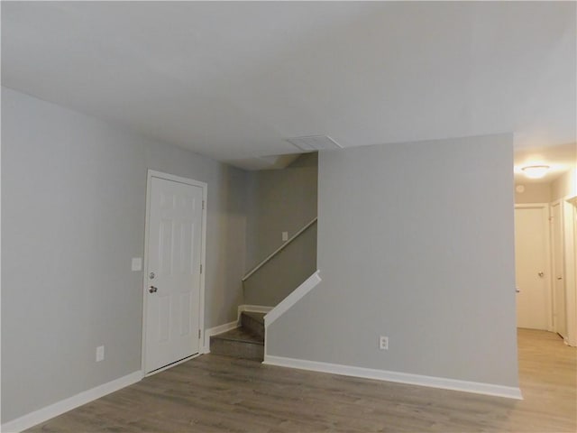 spare room with light hardwood / wood-style floors