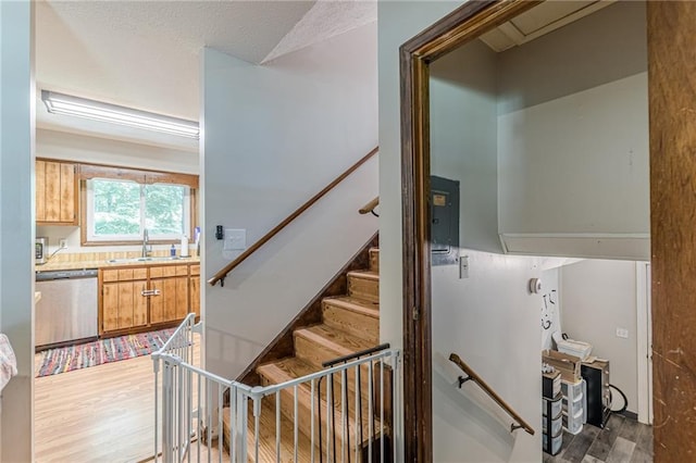 2642 Bridgehampton Rd SW, Marietta, GA 30064 - stairway with wood finished floors