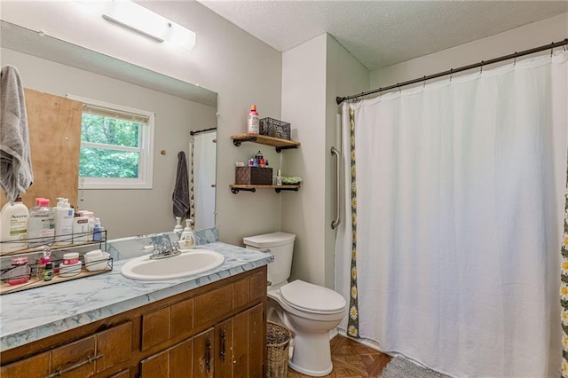 2642 Bridgehampton Rd SW, Marietta, GA 30064 - bathroom featuring vanity, toilet, a textured ceiling, and a shower with curtain