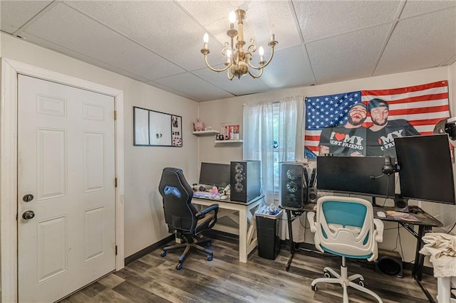 2642 Bridgehampton Rd SW, Marietta, GA 30064 - office with wood finished floors, a chandelier, and a paneled ceiling