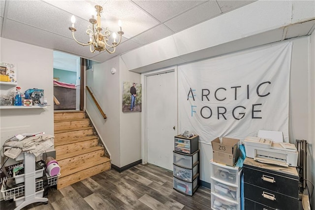2642 Bridgehampton Rd SW, Marietta, GA 30064 - home office featuring wood finished floors, a chandelier, and baseboards