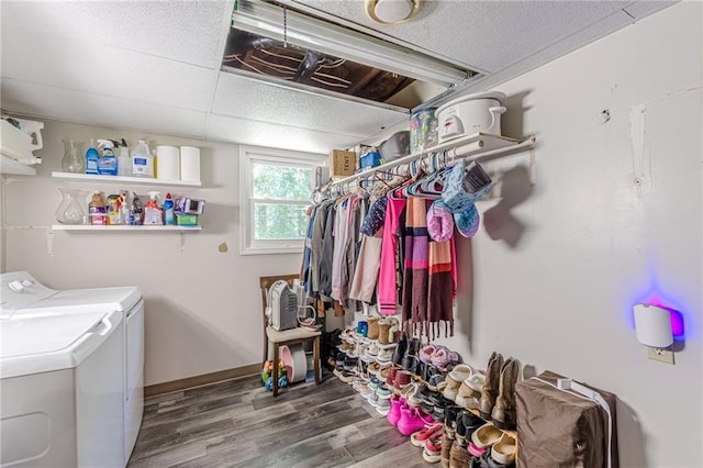 2642 Bridgehampton Rd SW, Marietta, GA 30064 - washroom featuring wood finished floors, washing machine and clothes dryer, and baseboards