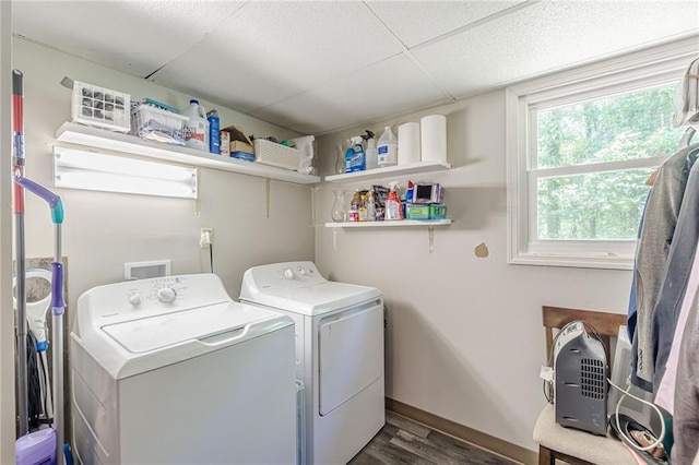 2642 Bridgehampton Rd SW, Marietta, GA 30064 - washroom featuring washer and dryer, dark wood-style floors, and baseboards