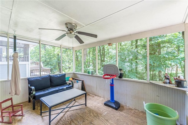 2642 Bridgehampton Rd SW, Marietta, GA 30064 - sunroom featuring a ceiling fan and an outdoor living space