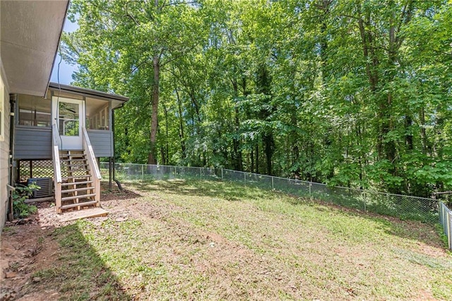 2642 Bridgehampton Rd SW, Marietta, GA 30064 - view of yard featuring a sunroom, stairway, and central AC unit