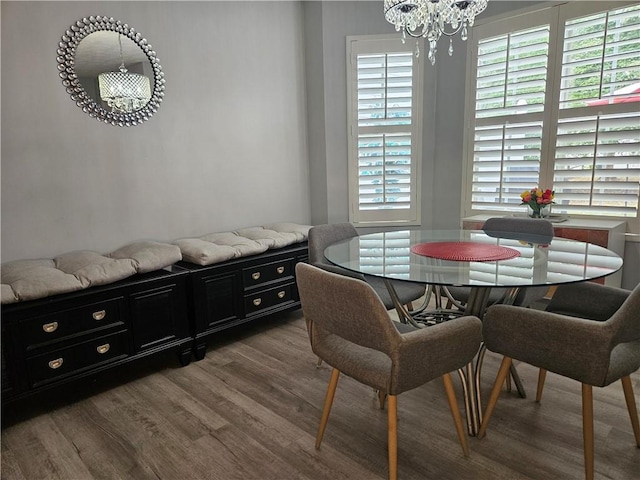5536 Strathmoor Manor Cir, Lithonia, GA 30058 - dining space with a chandelier and wood finished floors