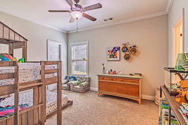 bedroom featuring crown molding, baseboards, visible vents, and light carpet