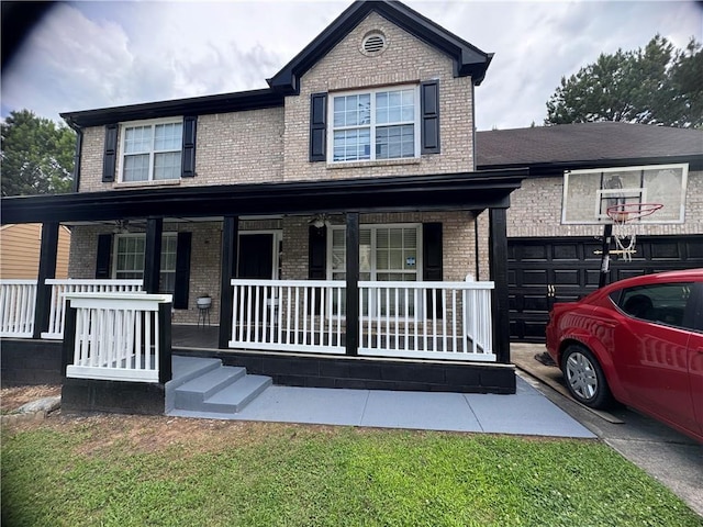 595 Castlebrooke Dr, Lawrenceville, GA 30045 - view of front facade featuring a porch and brick siding