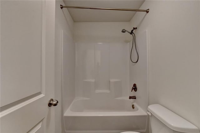 full bathroom featuring shower / bathing tub combination and toilet