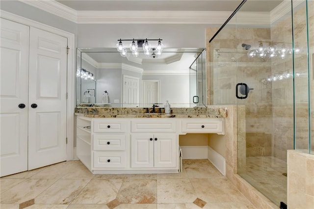 bathroom with tile floors, crown molding, walk in shower, and vanity