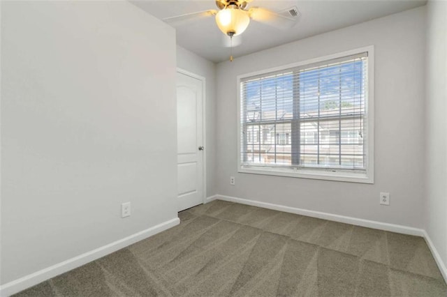 3170 Cedar Glade Ln, Buford, GA 30519 - spare room featuring carpet and a ceiling fan