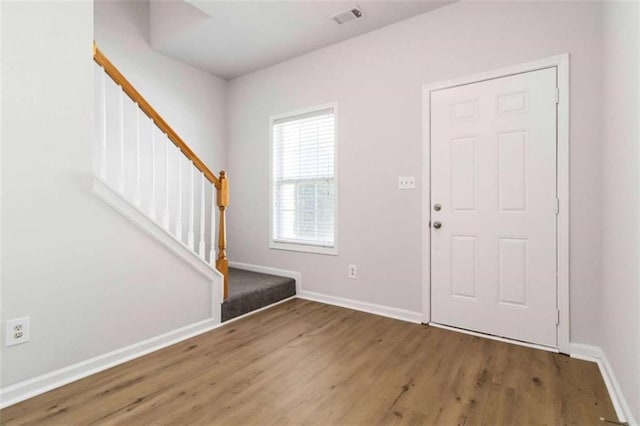 3170 Cedar Glade Ln, Buford, GA 30519 - foyer entrance featuring wood finished floors and stairs