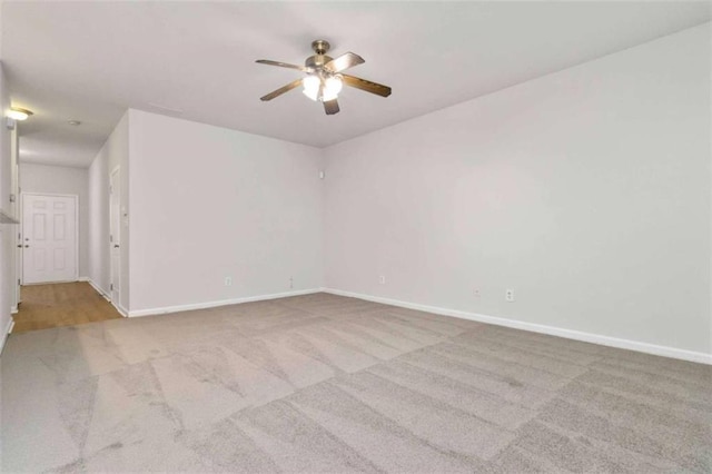 3170 Cedar Glade Ln, Buford, GA 30519 - carpeted spare room featuring a ceiling fan and baseboards