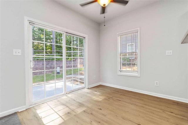 3170 Cedar Glade Ln, Buford, GA 30519 - spare room with ceiling fan and light wood-style floors