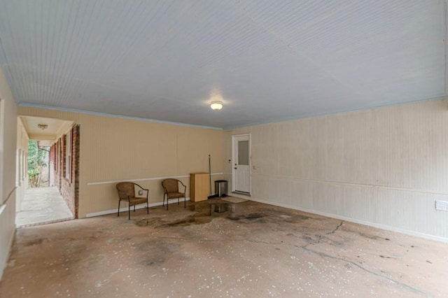spare room with concrete floors