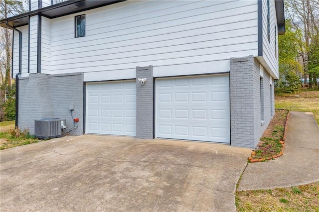 garage featuring central AC unit