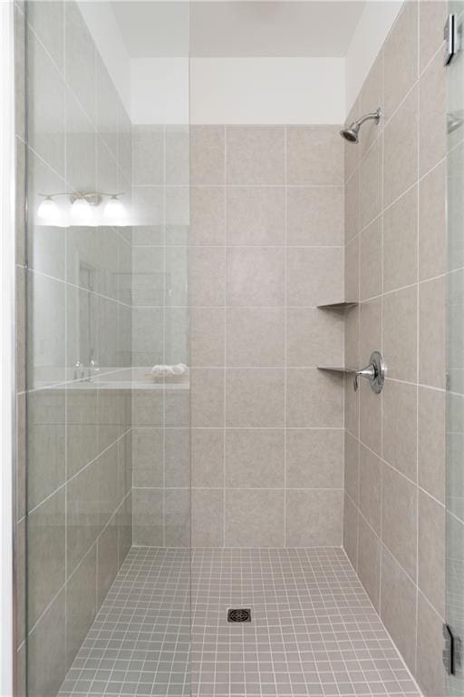 bathroom with a shower stall