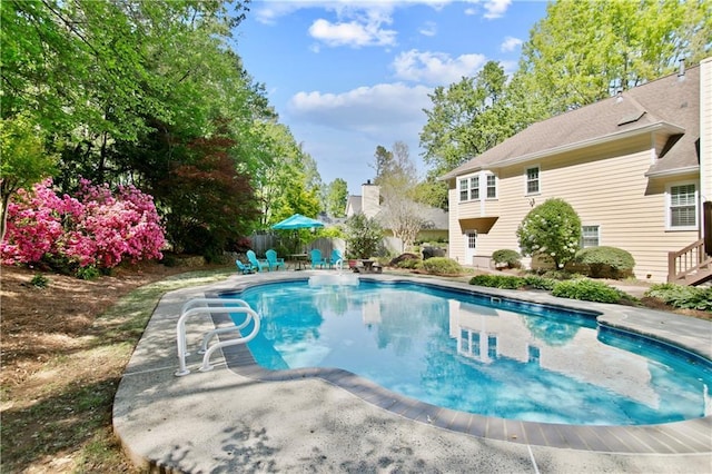 pool with a patio area