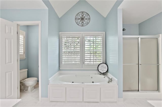 bathroom with a whirlpool tub, tile patterned floors, toilet, and a shower stall