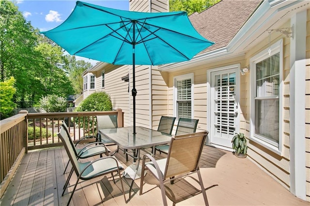exterior space with outdoor dining space