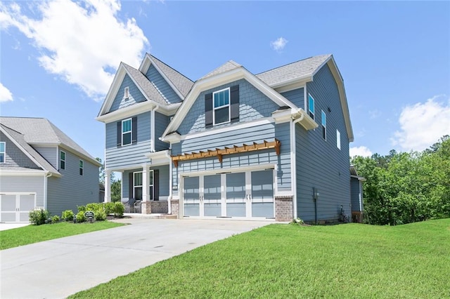 138 Daffodil Lndg, Dallas, GA 30132 - craftsman-style home featuring concrete driveway, a front yard, a garage, and covered porch