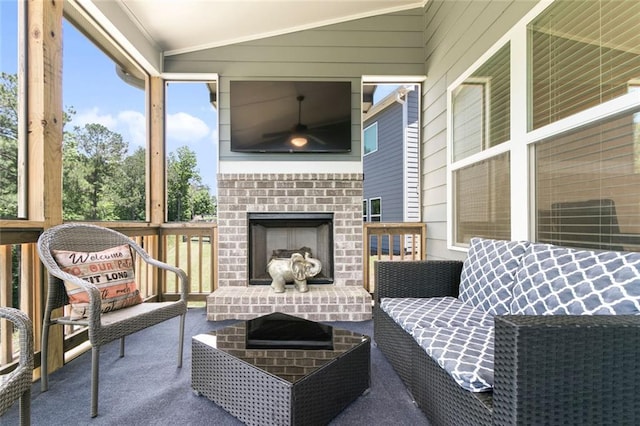 138 Daffodil Lndg, Dallas, GA 30132 - sunroom featuring ceiling fan, an outdoor living space with a fireplace, and lofted ceiling
