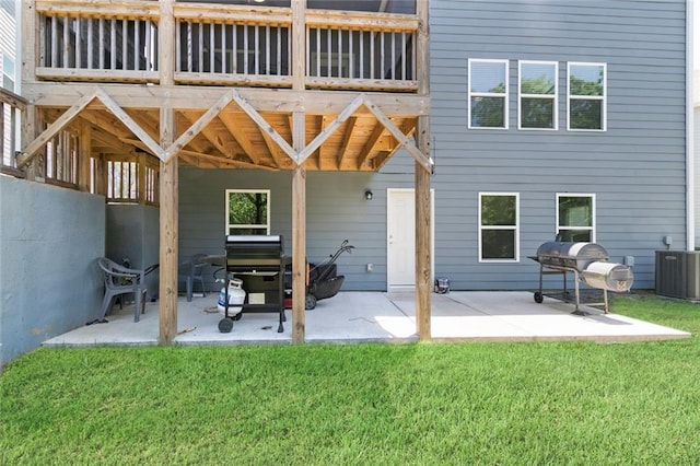 138 Daffodil Lndg, Dallas, GA 30132 - back of property featuring cooling unit, a lawn, and a patio