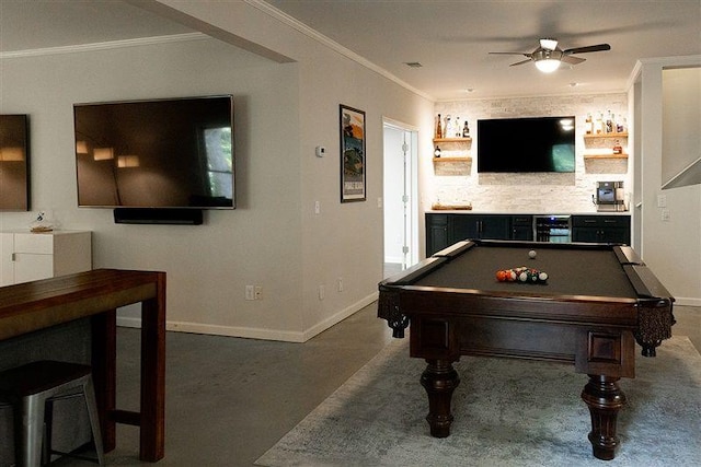 rec room featuring ceiling fan, ornamental molding, and billiards