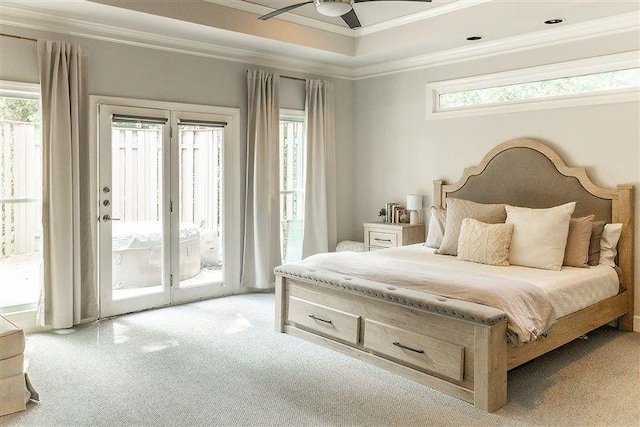 bedroom with multiple windows, ornamental molding, access to outside, and ceiling fan