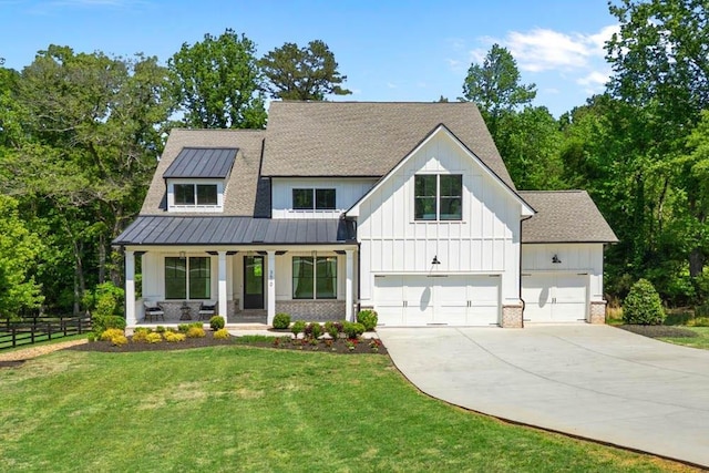 3610 Burnt Bridge Rd, Cumming, GA 30028 - modern inspired farmhouse featuring covered porch, driveway, board and batten siding, a standing seam roof, and a garage