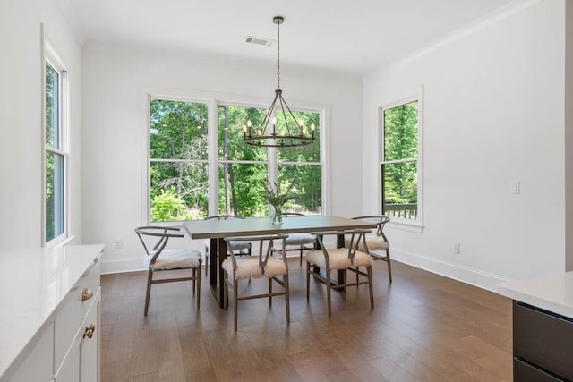 3610 Burnt Bridge Rd, Cumming, GA 30028 - dining room featuring a chandelier, plenty of natural light, and baseboards