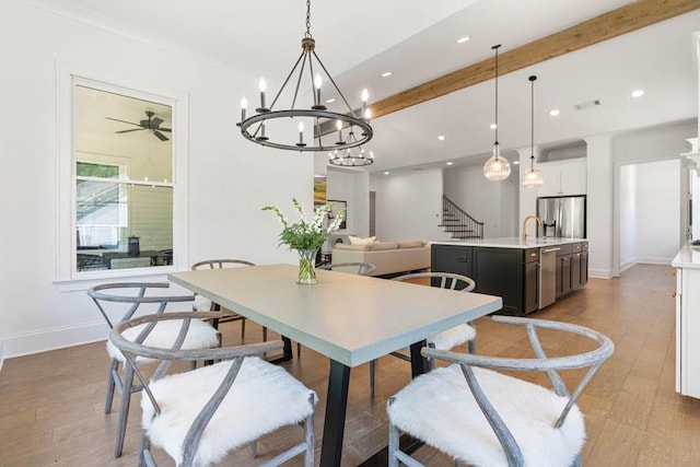 3610 Burnt Bridge Rd, Cumming, GA 30028 - dining space featuring beamed ceiling, a chandelier, stairway, recessed lighting, and baseboards