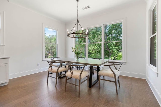 3610 Burnt Bridge Rd, Cumming, GA 30028 - dining area with a chandelier, baseboards, and dark wood-style floors