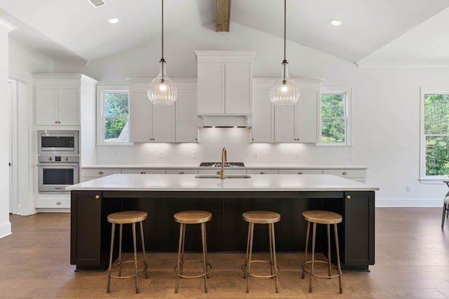 3610 Burnt Bridge Rd, Cumming, GA 30028 - kitchen featuring stainless steel appliances, a sink, light countertops, decorative backsplash, and recessed lighting