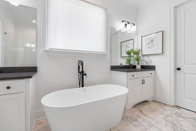 3610 Burnt Bridge Rd, Cumming, GA 30028 - full bath featuring marble look tiles, vanity, a soaking tub, and tiled shower